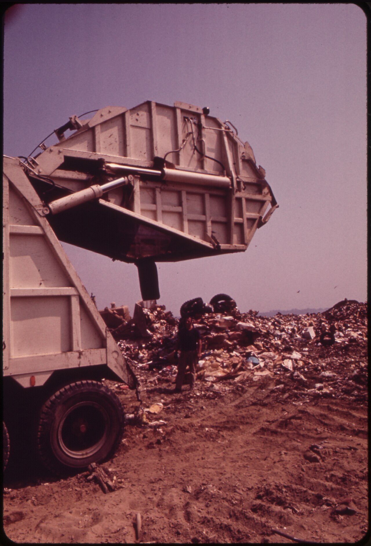 GARBAGE TRUCK AT CROTON LANDFILL OPERATION ALONG THE HUDSON RIVER - NARA - 549940.tif